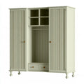 Armoire vert pâle à portes cannelées et niches centrales
